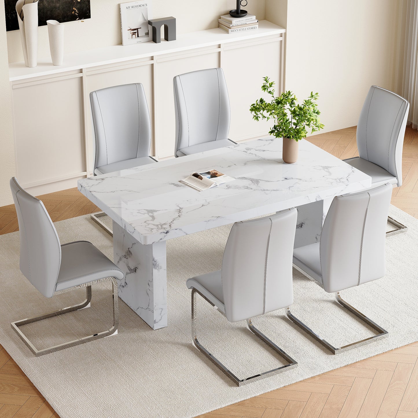 Table and chair set.63'*35.4' White Imitation Marble Pattern MDF Dining Table Set - 6 Soft and Comfortable Light Gray PU Chair With Arched Metal Silver Leg.Create Your Exclusive Low-Key Luxury Space.