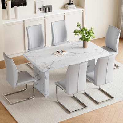 Table and chair set.63'*35.4' White Imitation Marble Pattern MDF Dining Table Set - 6 Soft and Comfortable Light Gray PU Chair With Arched Metal Silver Leg.Create Your Exclusive Low-Key Luxury Space.