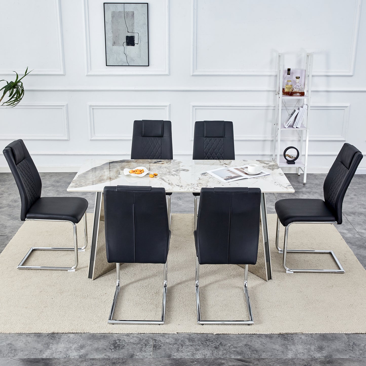 Table and chair set.63'x31.5x30' Luxurious Pandora patterned Sintered Stone Tabletop with Silver Stainless Steel Butterfly Legs.Paried With 6 Black High-quality PU Chairs With Arched Metal Legs.