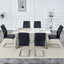 Table and chair set.63'x31.5x30' Luxurious Pandora patterned Sintered Stone Tabletop with Silver Stainless Steel Butterfly Legs.Paried With 6 Black High-quality PU Chairs With Arched Metal Legs.