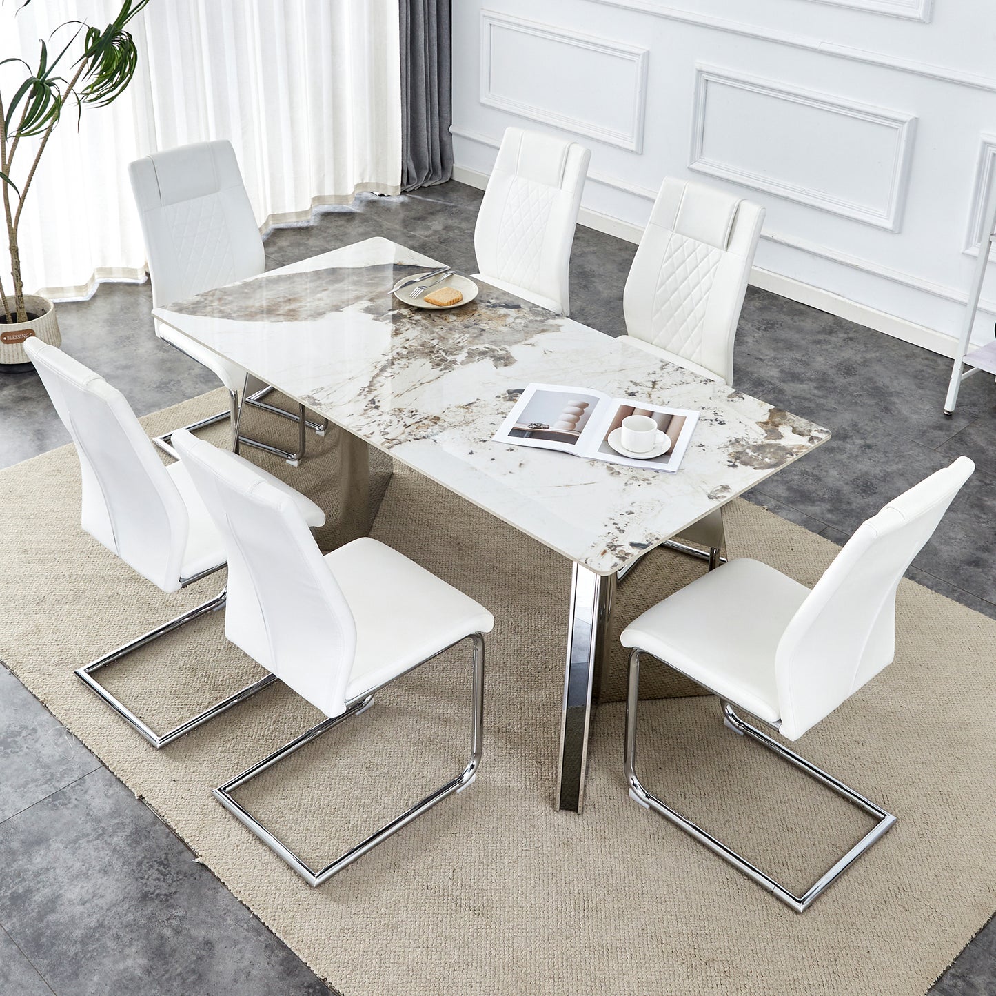 Table and chair set.63'x31.5x30' Luxurious Pandora patterned Sintered Stone Tabletop with Silver Stainless Steel Butterfly Legs.Paried With 6 White High-quality PU Chairs With Arched Metal Legs.
