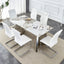 Table and chair set.63'x31.5x30' Luxurious Pandora patterned Sintered Stone Tabletop with Silver Stainless Steel Butterfly Legs.Paried With 6 White High-quality PU Chairs With Arched Metal Legs.