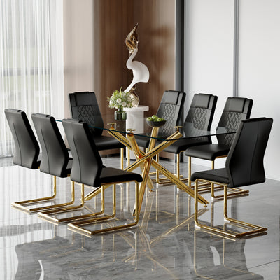 Table and chair set.Modern Luxurious Transparent Tempered Glass Dining Table Set with 8 Chairs.Single Fork Golden Metal Table Legs.Black high-quality PU dining chairs with golden metal legs.