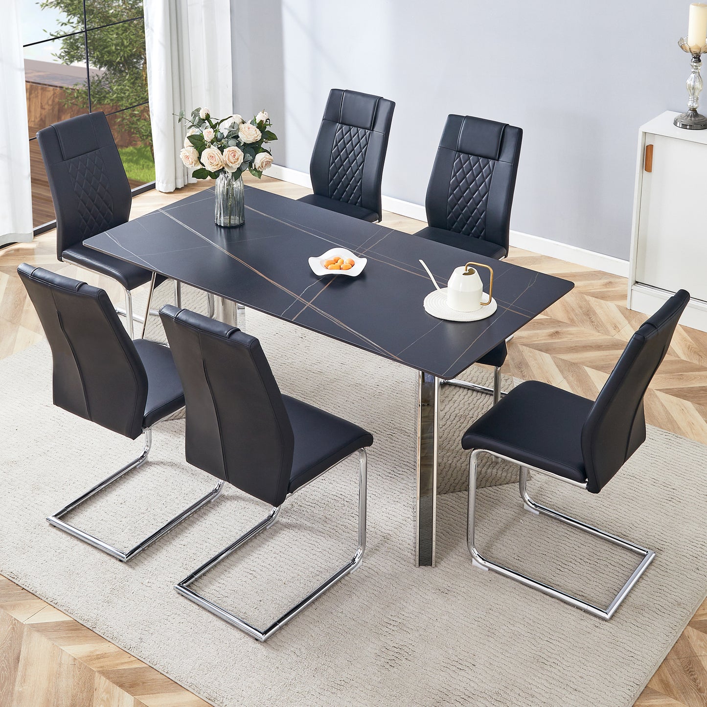 Table and chair set.63'x31.5x30' Black Marble-Patterned Slabs Tabletop with Stainless Steel Butterfly Legs.Paried with 6 Black high-quality PU chairs with silver metal legs.